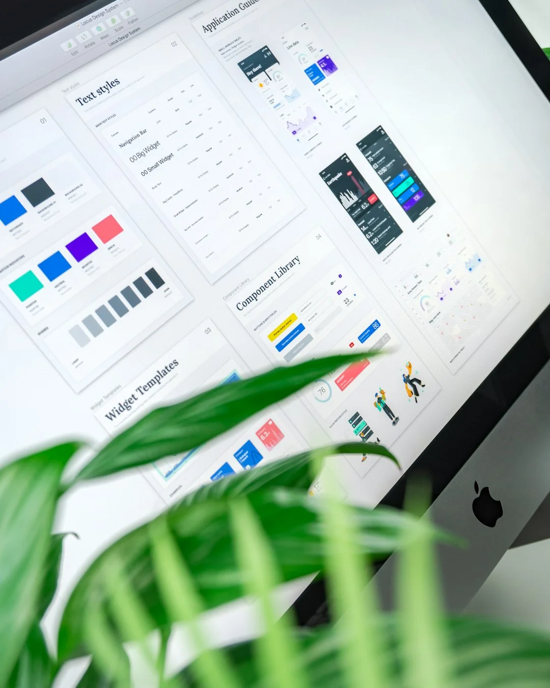 A clean and modern workspace featuring a laptop, tablet, smartphone, and monitor. Ideal for remote work and tech setups.